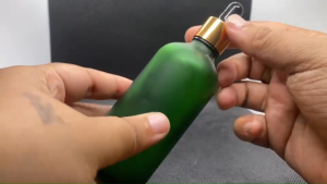 ขวด 100 มล.(3ใบ)สีเขียวขุ่น+ฝาทองเงา+บีบดำ+หลอดแก้ว 09#18