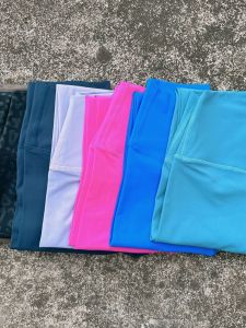 กางเกงออกกำลังกายเอวสูงกระชับสัดส่วนทรงหลวมสบาย ๆ กางเกงขายาวทรงหลวมสไตล์สตรีทสำหรับผู้หญิง