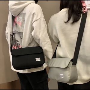 กระเป๋าสะพายข้าง กระเป๋าสะพายไหล่ ใช้ได้ทั้ง ผู้ชาย ผู้หญิง รหัส 8024 ผลิตจาก ผ้าโพลี กันน้ำได้ ช่องเก็บเยอะ น้ำหนักเบา มีหลายสี กระเป๋าสะพายข้างผู้หญิง กระเป๋าสะพายข้างผู้ชาย - Lazada