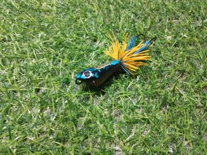 (1/ตัว)เหยื่อส่ายหน้า รุ่นส่ายพิฆาต งานไม้โมกมัน