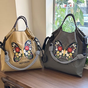 กระเป๋าผ้าใบผูกข้างลายผีเสื้อและดอกไม้แบบยั่งยืนสำหรับผู้หญิง ความจุขนาดใหญ่ กระเป๋าสะพายข้างสำหรับเดินทาง สายโซ่ลูกปัด