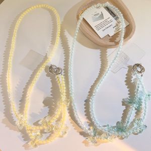 สร้อยโทรศัพท์แบบสะพายข้างพร้อมโบว์ผีเสื้อสีสวยหรู สายรัดห้อยโซ่โทรศัพท์มือถือแบบยาวสำหรับเด็กผู้หญิง สร้อยคอโทรศัพท์มือถือ