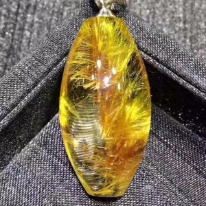 Pure natural golden hair crystal transfer bead Lu Lu Tong pendant. The transfer beads are plump and round and the actual product is very beautiful. Wearing it can attract wealth and bring good luck and smoothness.