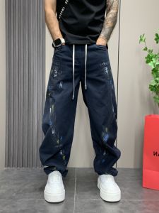 Trendy Loose Straight Leg Jeans Graffiti Knife Edge Casual Mens Design Sensation Long Pants Autumn Fashion Street Style