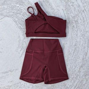 ผู้หญิง 2 ชิ้นชุดกีฬาโยคะเซ็กซี่สปอร์ตบราเอวสูงกีฬากางเกงขาสั้นกระเป๋ายิมฟิตเนสแขนกุดชุดออกกำลังกายชุดกีฬา