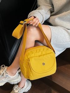 2025 New round Commuter Shoulder Bag Womens Outing Crossbody Bag High Aesthetic Value Versatile Nylon Material Zipper Closure
