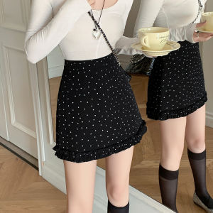 Yimei phù hợp với Polka Dot váy cho phụ nữ trong mùa xuân và mùa hè 2025 với Polka Dot A-line và đen tai nấm cạnh váy quấn quanh mông trong màu đen