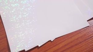 A4 Holographic Sticker Paper 50 Sheets Self-Adhesive Glitter Film Waterproof Vinyl Suitable for DIY Crafts 8.3x11.7 Inches