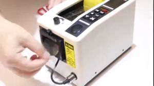 เครื่องตัดเทปพีวีซี อัตโนมัติ M-1000 Adhesive Tape Packaging Machine Cutting Tool Office Equipmentตู้เทปอัตโนมัติ ตู้เทปบรรจุ 7-50 มม เครื่องตัดเทป