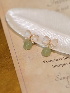 LL 18K GOLDEN Korean Bow knot imitation jade pearl round resin temperament earrings ES69121