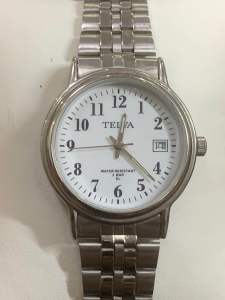 Đồng hồ nam hiệu TELVA Quartz size 35mm 1 lịch máy to có đèn sáng mặt trắng cọc số học trò dây thép không gỉ khóa thông minh chống nước 3BAR