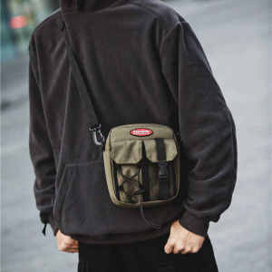 กระเป๋าสะพายข้างแบบสะพายข้างสำหรับผู้ชายและผู้หญิงที่เรียบง่ายและมีสไตล์สำหรับนักเรียน กระเป๋าสะพายข้างแบบลำลองสไตล์เกาหลีและญี่ปุ่น