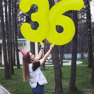 Neon fluorescent yellow digital balloons glowing party balloons used for birthday parties and anniversary decorations