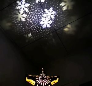 NUVOX Christmas Star Tree Topper with Built-in Led Snowflake Projector Lights Hollowed Pentagram Tree TopperPlug in Christmas Tree Ornament for Indoor Office Xmas New Year Holiday Tree Decoration