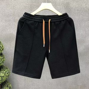 กางเกงขาสั้นชายผ้าฝ้ายลำลองสไตล์ฤดูร้อน ทรงหลวมสบายๆ สำหรับใส่ไปชายหาด หัวเข็มขัดแบบผูกเชือก กางเกงขายาวทรงตรง สีสันสดใส แฟชั่นสำหรับวัยรุ่น