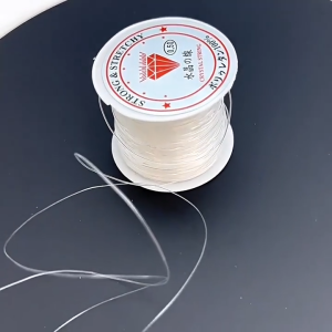 เอ็นใสพันมอส เอ็นพันขอนไม้ เส้นเล็ก เอ็นพันมอสและต้นไม้น้ำ สีใส มอส พันมอส เพาะมอส เลี้ยงมอส ไม้น้ำ