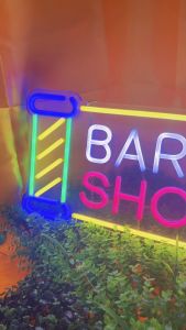 ป้ายไฟ ตัดผม BARBER SHOP ป้ายร้าน ร้านเสริมสวย กลางวันก็เห็นชัด หลอดนีออนกินไฟน้อย แต่สว่างมาก เพิ่มเอกลักษณ์สีสัน สวยงาม ตกแต่ง