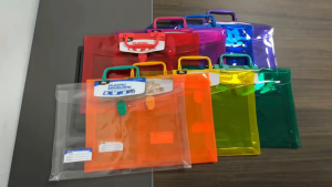 High Quality Colored Plastic envelope with handle / zipper and push lock envelope sold per 1pc