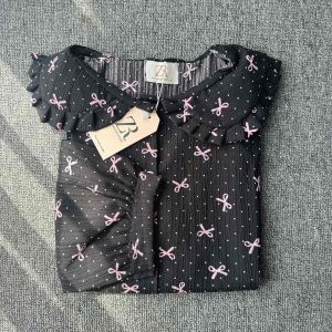 SUZY BLOUSE WANITA RAMPLE UNIK MOTIF FLORAL CRINKLE AIRFLOW