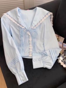 เสื้อเชิ้ตผู้หญิงคอปกสีน้ำเงินลายลูกไม้สีฟ้า กระโปรงทรงเอ แขนยาว คอกลม สไตล์เกาหลี ฤดูใบไม้ผลิ 2025