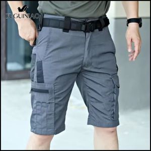 FUGUINIAO กางเกงขาสั้นยุทธวิธีผู้ชายมีกระเป๋าหลายใบระบายอากาศได้ดีแห้งเร็วสำหรับการเดินป่าตกปลาและกิจกรรมกลางแจ้ง