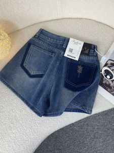 กางเกงขาสั้นผ้ายีนส์เอวสูงทรงหลวมสำหรับฤดูร้อนปี 2025 กางเกงขาสั้นทรงเอเข้ารูปสีบล็อก กางเกงขายาวทรงหลวมสำหรับผู้หญิง