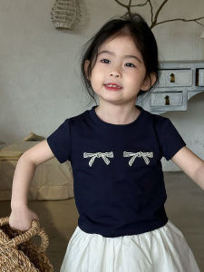 เสื้อยืดผู้หญิงแขนสั้นลายปักผูกโบว์ ทรงหลวม สไตล์เกาหลี สำหรับเด็ก แฟชั่นฤดูร้อน เสื้อผ้าเด็ก ผ้าฝ้าย