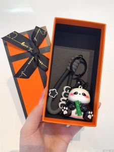 ลูกปัดพีชไม้แพนด้าสะท้อนแสงพร้อมกล่องของขวัญพร้อมหัวเข็มขัดรถยนต์ ห้อยกระเป๋า โลหะผสม พิมพ์ลายหมีแพนด้า