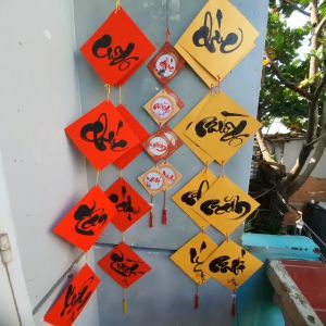 Câu đối trang trí tết. Câu đối tết viết theo yêu cầu