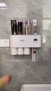 Bộ nhả kem đánh răng tự động OENON Kệ để đồ phòng tắm kèm 2 cốc hút nam châm (Tặng kềm miếng dán)