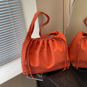 กระเป๋าผ้าใบผู้หญิงแบบลำลองสไตล์เกาหลี ความจุขนาดใหญ่ กระเป๋าสะพายข้างแบบสะพายข้าง สายรัดแบบผูกเชือก กระเป๋าผ้าใบสำหรับเดินทาง กระเป๋าสะพายข้างสำหรับใส่ไปเรียน