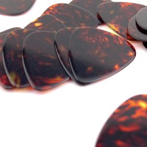 ปิ๊กกีตาร์ Celluloid สีน้ำตาลมุก | 10 ชิ้น | 0.46 / 0.71 / 1.0 มม. | เขียน-พิมพ์-เลเซอร์ได้ | ลุควินเทจ ดูดีมีสไตล์