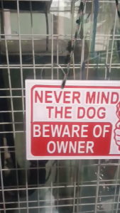 NEVER MIND THE DOG BEWARE OF OWNER.  GATE SIGNAGE. ACRYLIC VINYL. WITH HANGING ROPE. 5"X8" 3 mm. WHITE BACKGROUND RED FONTS. AVAILABLE IN ANY SIZE AND COLOR. We accept customized design and bulk orders. we are open for resellers and commission basis. Mes