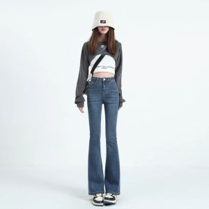 กางเกงยีนส์ขาม้าเอวสูงแนววินเทจสำหรับผู้หญิงกางเกงทรงกระดิ่งกันหนาวบุขนกำมะหยี่เข้ารูปใส่แล้วดูผอมเพรียวแบบใหม่ฤดูใบไม้ร่วงและฤดูหนาวปี2023