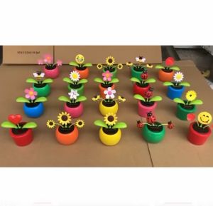 Chậu hoa nhảy múa lắc lư sử dụng năng lượng mặt trời trang trí taplo xe hơi