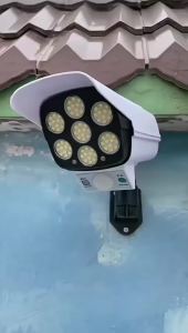 3 Modes Multi-angle Lighting Remote Control Solar Powered Simulation Monitoring Induction Wall Lamp with Red Light Warning