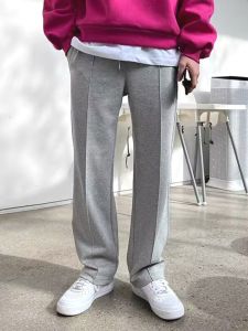 กางเกงวอร์มทรงหลวมสไตล์เกาหลีสำหรับผู้ชาย กางเกงขายาวทรงตรงลำลอง ดีไซน์เย็บต่อแบบมีเส้นตรง กางเกงขายาวสไตล์อเมริกันสตรีทเทรนดี้