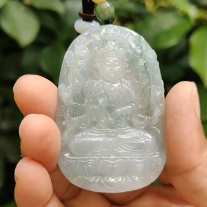 High Quality Light Green Hue Good Translucent Natural Type A Jadeite Jade crafted with Thousand Hands Guanyin as Pendant certificate weighs 31.12 grams measurement 57.6 * 38.4 * 6.8 mm (pendant293)