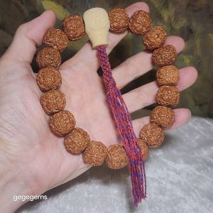 Rare large size 19mm small species "Dragon Scales" Rudraksha Tibetan style 18 mala beads handheld bracelet with an "Ivory Fruit (Tagua)" carved dragon guru bead and a handmade Tibetan cotton threads tassel