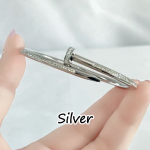 SO SEOUL Nail It Encrusted White Austrian Crystal Silver or Rose Gold Middle Hinged Bangle