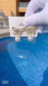 ต่างหูแฟชั่น  ต่างหูมุกโบว์ พร้อมส่งจากไทย