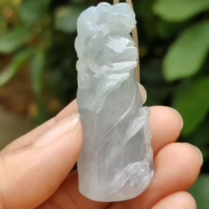 A Bamboo with Pixiu Crafted on Light Green Hue with Light Lavender Natural Type A Burmese Jadeite Jewellery certificate weighs 23.91 grams measurement 50.3 * 20.6 * 12.8 mm (pendant 318)