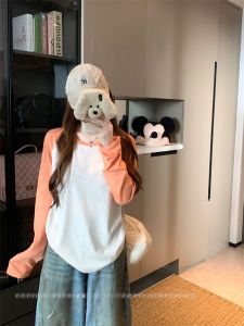 เสื้อยืดคอกลมแขนยาวทรงหลวมสไตล์เกาหลีสำหรับผู้หญิง 2025 ฤดูใบไม้ร่วง ผ้าฝ้าย ผ้าโพลีเอสเตอร์ ทรงหลวม ปกติ