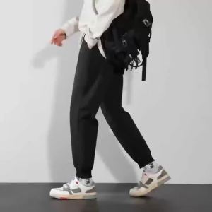 Bandai | Black Tapered Harem Joggers Pants with Digimon Anime Angelmon Patamon Colorful Print Loose Fit Cuffed Hip Hop Sweatpants for Men
