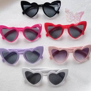 Fashionable trendsetter individuality bachelorette party heart shaped sunglasses