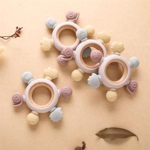 Wooden baby silicone multi-directional bite teether