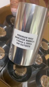 Ribbon Premium Wax ริบบอนพิมพ์บาร์โค้ด พิมพ์ฉลาก ใบปะหน้ากล่อง 110mm x 300m Ink Outside