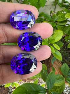 พลอยเพชรรัสเซีย สีม่วงน้ำเงิน เหลี่ยมชั้น รูปไข่ CUBIC ZIRCONIA ink blue violet 15x20mm STEP CUTTING GEMSTONE STONE 1 PCS