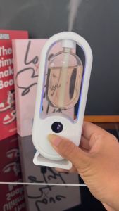 เครื่องพ่นไอน้ํา เครื่องพ่นอโรม่า เครื่องฟอกอากาศอโรมา กระจายกลิ่นหอมยาวนาน กระจายกลิ่นอโรมา สเปรย์น้ําหอมปรับอากาศอัตโนมัติ สําหรับบ้าน ห้องนั่งเล่น น้ํามันหอมระเหย 5 โหมดสเปรย์น้ำหอม น้ํามันหอมระเหย สเปรย์ป