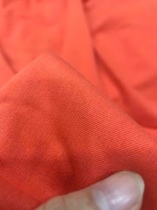 vải cotton lụa hàn quốc màu cam dày vừa _( khổ 1m5) co dãn nhẹ may đầm váy vest quần tây